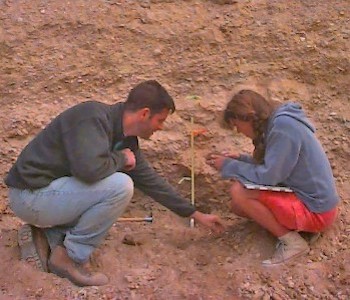 Earth Scientists sampling dirt
