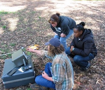 Geoscientists conducting fieldwork