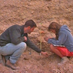 Earth Scientists sampling dirt