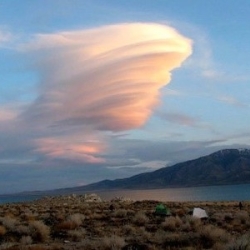 Unusual cloud over a mountain lake